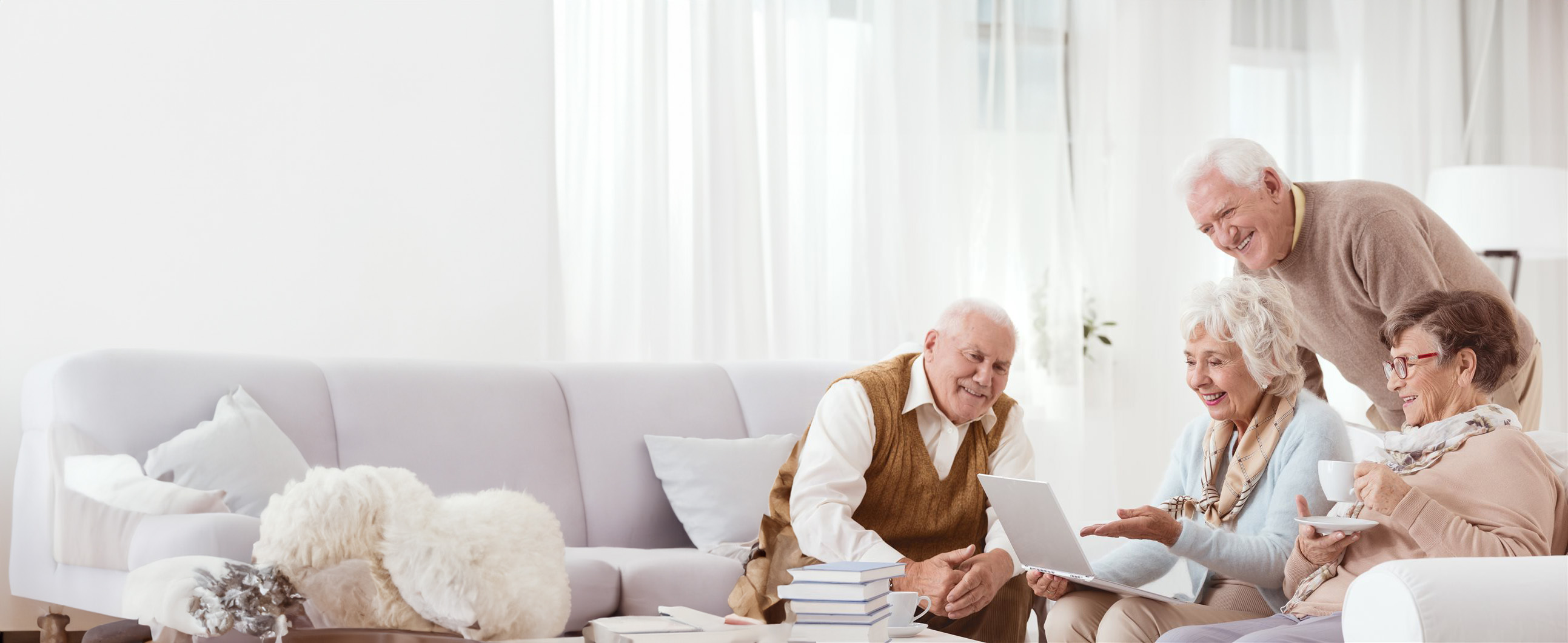 A group of older adults reviewing information together